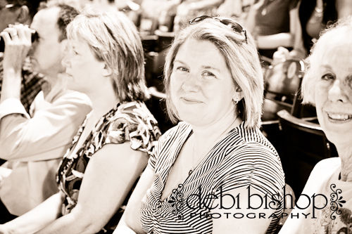 Father looks on at Rogers graduation.